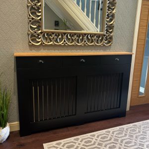 Black Radiator Cover with drawers and vertical slat design and a teak oil Solid Oak Top